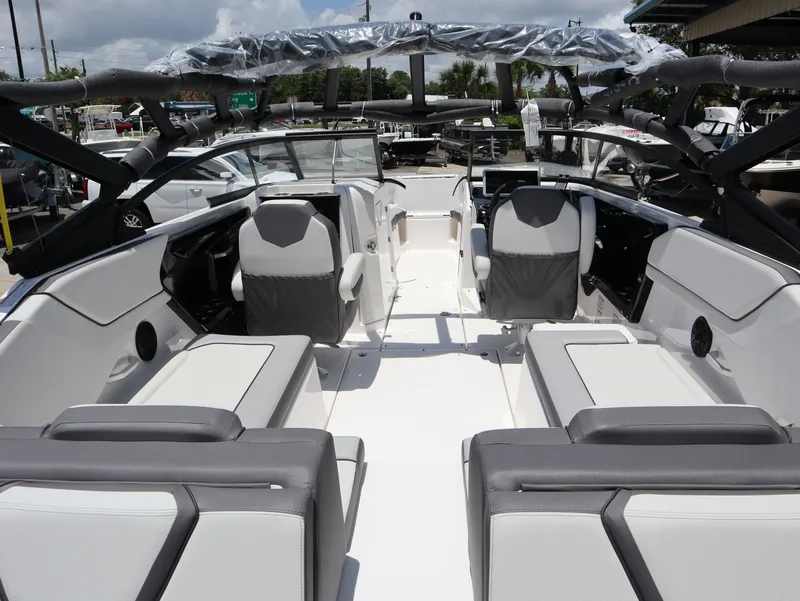 Slide: The Image of Interior of 2026 Yamaha Boats SX250 with modern seating. - 9