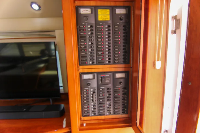 Slide: The Image of Electrical panel inside 2006 Riviera 47 Open Flybridge Series II yacht. - 25