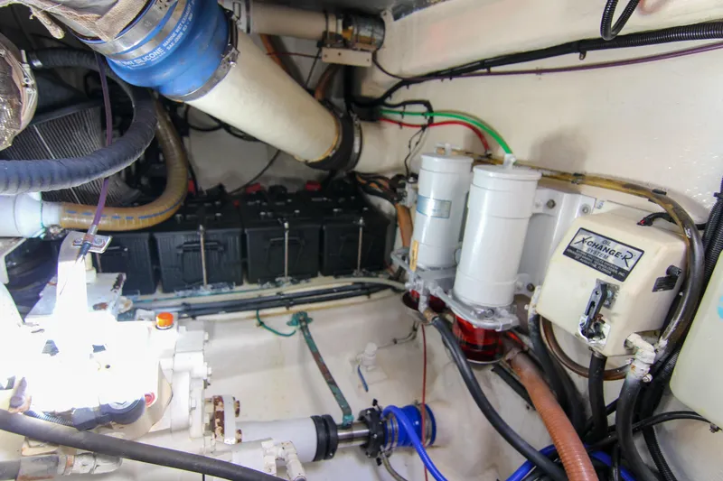 Slide: The Image of Engine room of 2006 Riviera 47 Open Flybridge Series II with mechanical components. - 39