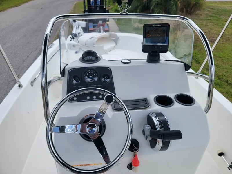 Slide: The Image of Interior view of a 2013 Boston Whaler 170 Dauntless boat. - 5