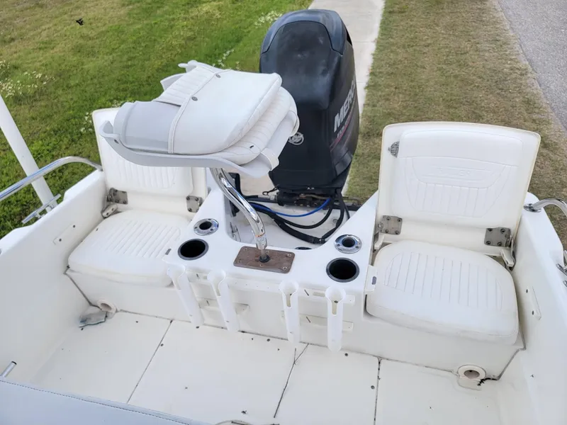 Slide: The Image of Interior of a 2013 Boston Whaler 170 Dauntless boat with seating. - 7