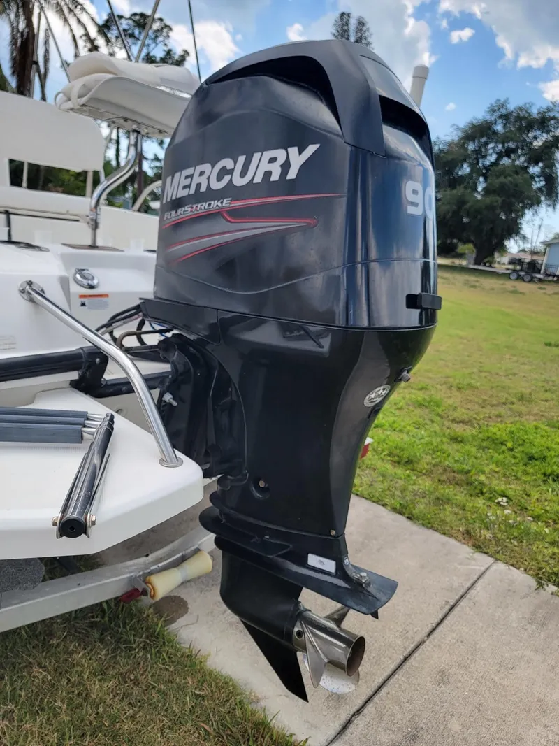 Slide: The Image of 2013 Boston Whaler 170 Dauntless with Mercury 90 HP outboard motor. - 9