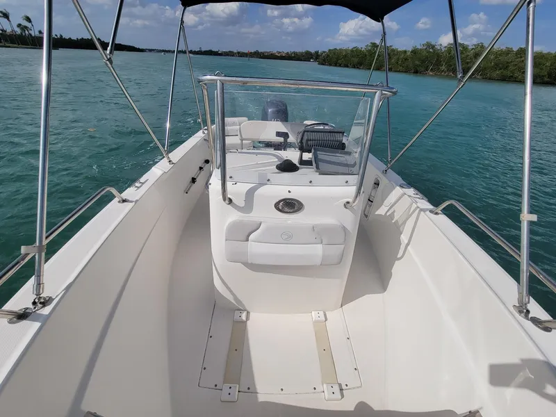Slide: The Image of 2013 Edgewater 170CC boat on calm waters. - 4