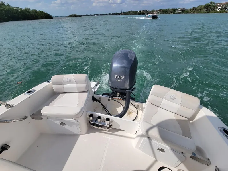 Slide: The Image of 2013 Edgewater 170CC boat with Yamaha 115 engine on open water. - 6