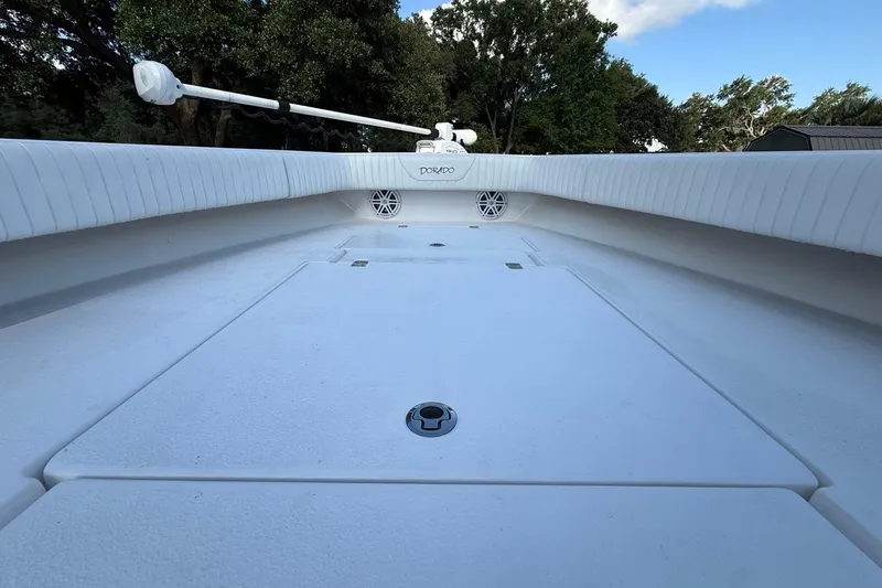 Slide: The Image of 2017 Dorado 25 SE boat deck with white finish and mounted equipment. - 25