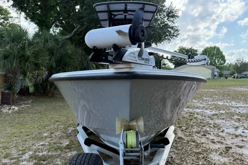 Slide: The Image of 2017 Dorado 25 SE boat on trailer, featuring Minn Kota trolling motor. - 4