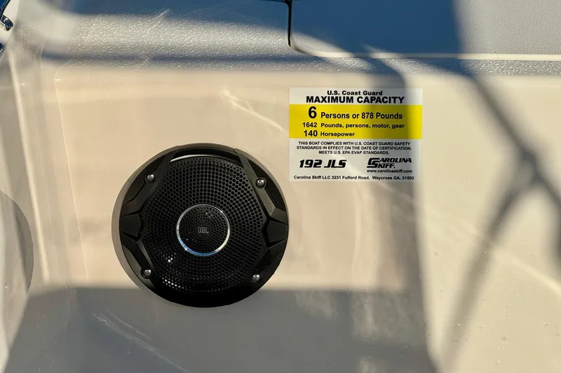 Slide: The Image of 2025 Carolina Skiff 192 JLS capacity label and JBL speaker detail. - 12