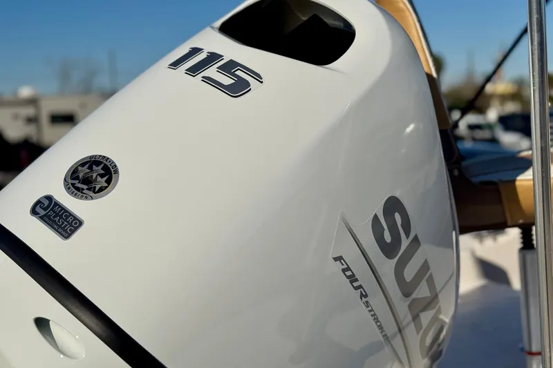 Slide: The Image of Outboard motor on 2025 Carolina Skiff 192 JLS, featuring Suzuki four-stroke engine. - 20