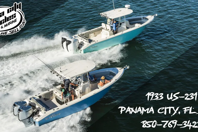 Slide: The Image of Two Sea Chaser 30 HFC CC boats cruising on water, 2023 model. - 10