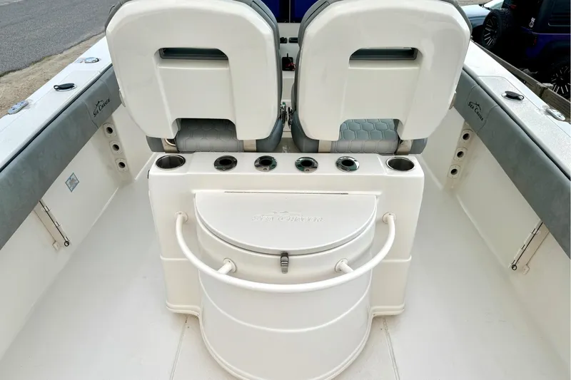 Slide: The Image of 2023 Sea Chaser 30 HFC CC boat interior with seating and storage compartments. - 25