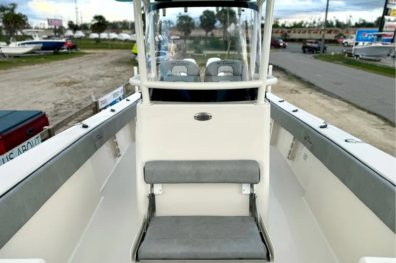 Slide: The Image of 2023 Sea Chaser 30 HFC CC boat interior with seating and console view. - 46