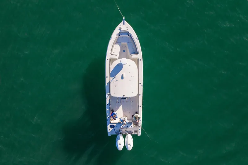 Slide: The Image of Aerial view of 2023 Sea Chaser 30 HFC CC boat on green water. - 59