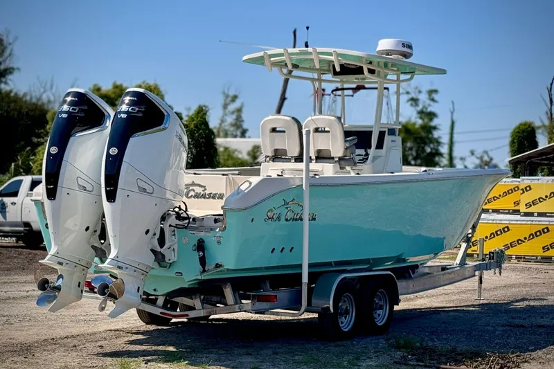 Slide: The Image of 2023 Sea Chaser 30 HFC CC boat with twin Yamaha 350 V8 engines on a trailer. - 6