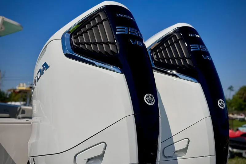 Slide: The Image of Twin Honda 350 V8 outboard engines on a 2023 Sea Chaser 30 HFC CC boat. - 7