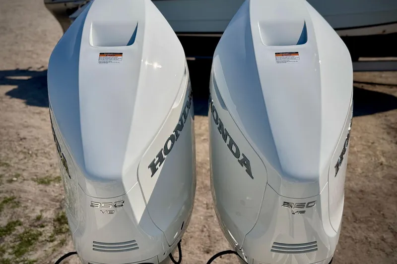 Slide: The Image of Twin Honda 350 V8 outboard engines on a 2023 Sea Chaser 30 HFC CC boat. - 8