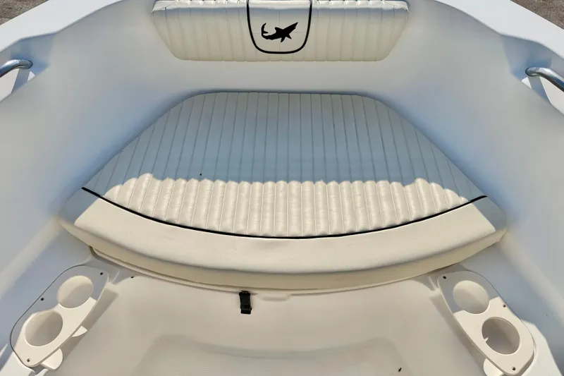 Slide: The Image of Interior seating of 2009 Mako 216 Dual Console boat with cup holders. - 10