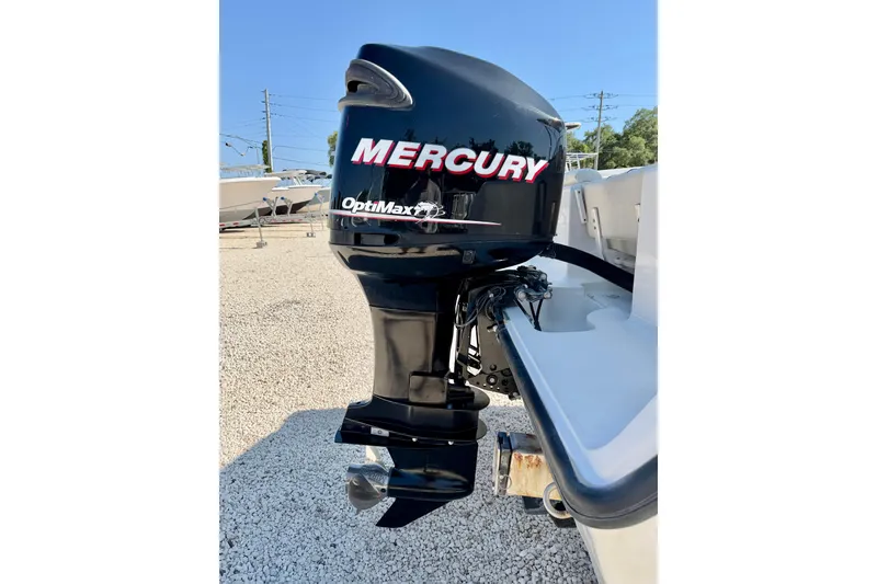 Slide: The Image of 2009 Mako 216 Dual Console with Mercury OptiMax outboard motor. - 32
