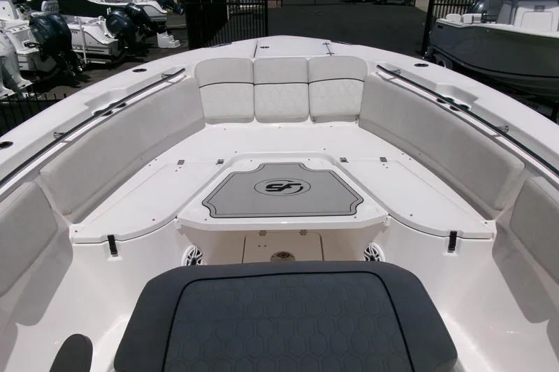 Slide: The Image of 2022 Sea Fox 288 Commander boat interior with spacious seating and sleek design. - 10