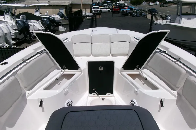Slide: The Image of 2022 Sea Fox 288 Commander boat interior with open storage compartments. - 11