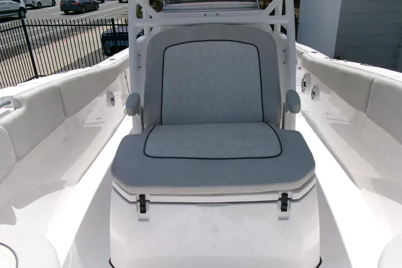 Slide: The Image of 2022 Sea Fox 288 Commander boat interior with cushioned seating and sleek design. - 14