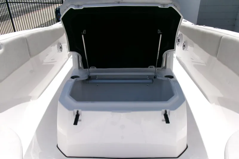 Slide: The Image of 2022 Sea Fox 288 Commander boat storage compartment open, showcasing spacious interior. - 15