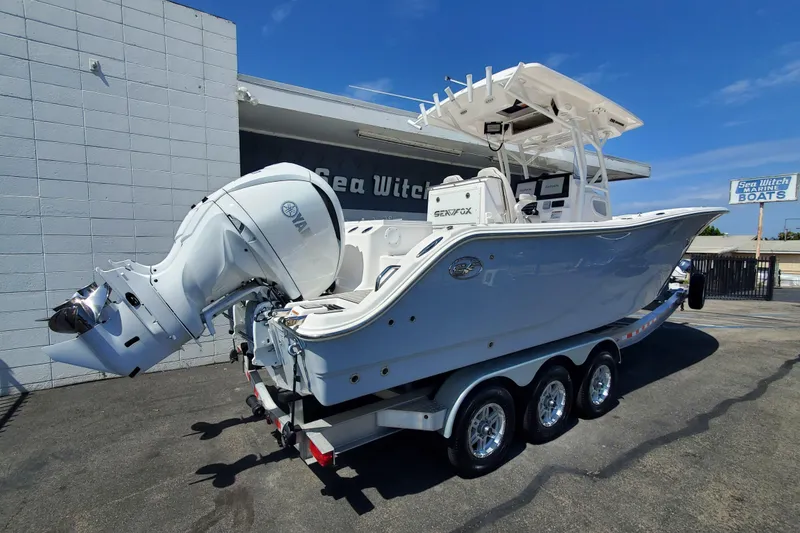 Slide: The Image of 2022 Sea Fox 288 Commander boat on trailer at Sea Witch Marine dealership. - 2