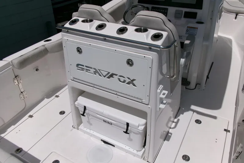 Slide: The Image of 2022 Sea Fox 288 Commander boat interior with seating and storage compartments. - 23