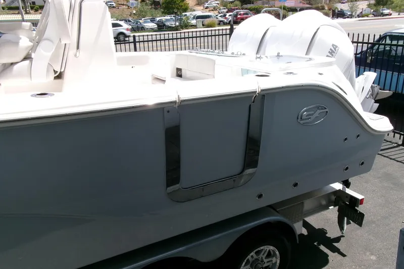 Slide: The Image of 2022 Sea Fox 288 Commander boat on trailer, rear view with dual engines. - 26