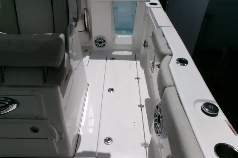 Slide: The Image of Interior view of 2022 Sea Fox 288 Commander boat, featuring seating and storage areas. - 29