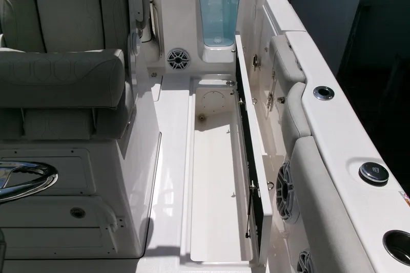 Slide: The Image of 2022 Sea Fox 288 Commander boat interior with seating and storage compartment. - 30