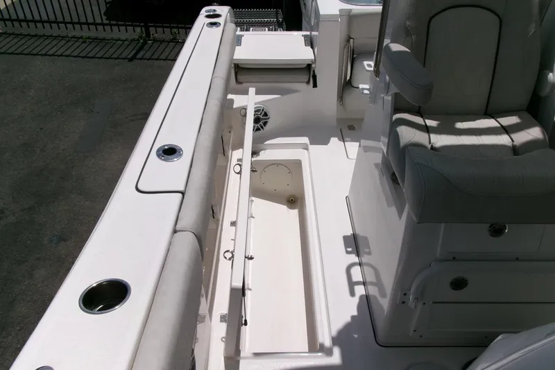 Slide: The Image of 2022 Sea Fox 288 Commander boat interior with seating and storage compartments. - 32