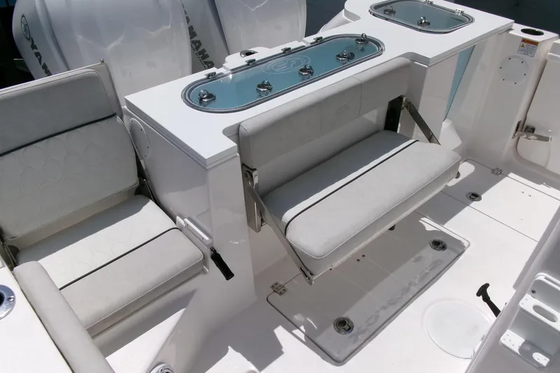 Slide: The Image of 2022 Sea Fox 288 Commander boat interior with seating and storage compartments. - 34