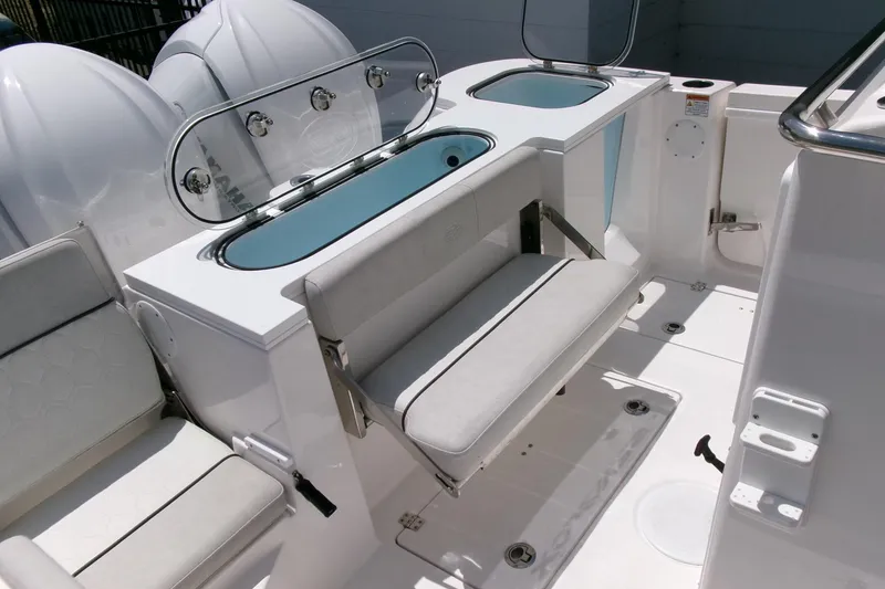 Slide: The Image of 2022 Sea Fox 288 Commander boat interior with seating and storage compartments. - 35