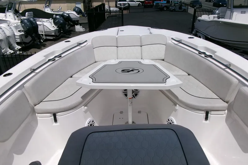 Slide: The Image of 2022 Sea Fox 288 Commander boat interior with cushioned seating and table. - 7