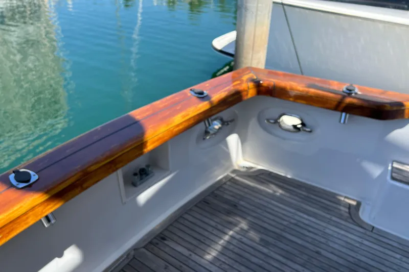 Slide: The Image of Ocean Alexander 42 yacht deck with chairs, docked in a marina, 1990 model. - 3