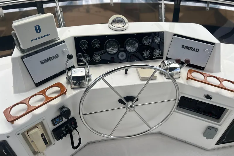 Slide: The Image of Helm of 1990 Ocean Alexander 42 yacht with Simrad and Furuno navigation equipment. - 9
