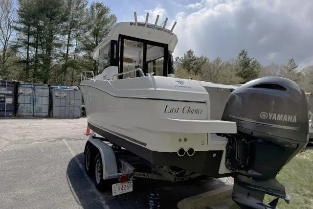 Slide: The Image of 2018 Jeanneau NC Sport 695 boat on trailer with Yamaha outboard motor. - 4