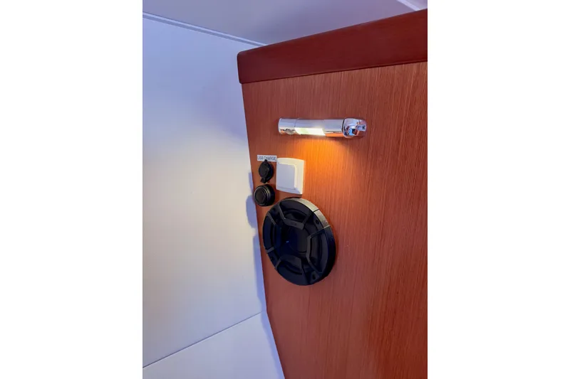 Slide: The Image of Interior of 2010 Beneteau Oceanis 34 yacht with USB charger and light fixture. - 46