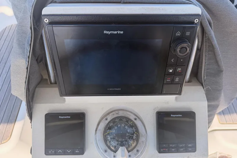 Slide: The Image of Raymarine navigation system on 2010 Beneteau Oceanis 37 sailboat dashboard. - 9