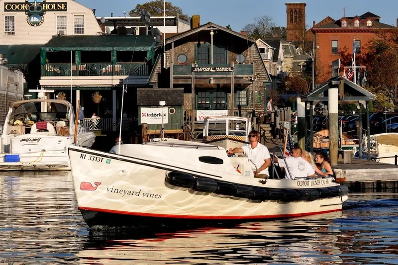 Slide: The Image of Boat cruising near Oldport Marine, Newport, with passengers enjoying a sunny day. - 4