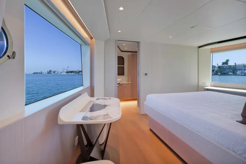 Slide: The Image of Luxurious interior of 2027 Absolute Navetta 62 yacht with scenic ocean view. - 18
