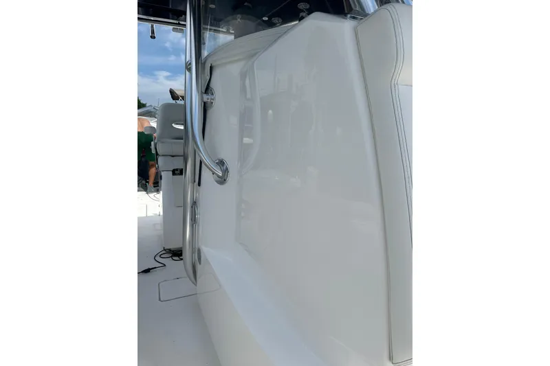 Slide: The Image of 2019 Contender 35 ST boat interior with sleek white design and chrome accents. - 18