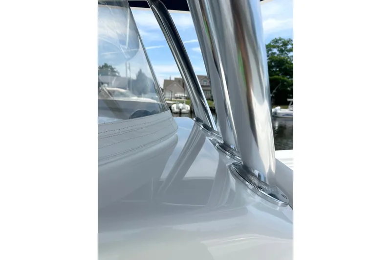 Slide: The Image of Close-up of 2019 Contender 35 ST boat's sleek metal railings and windshield. - 19