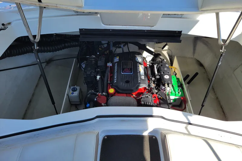 Slide: The Image of Engine compartment of a 2006 Cobalt 250 boat with Volvo Penta engine. - 18