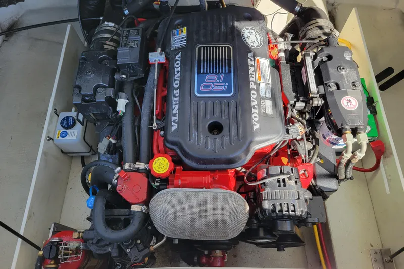 Slide: The Image of Volvo Penta engine in a 2006 Cobalt 250 boat, showcasing detailed components. - 19