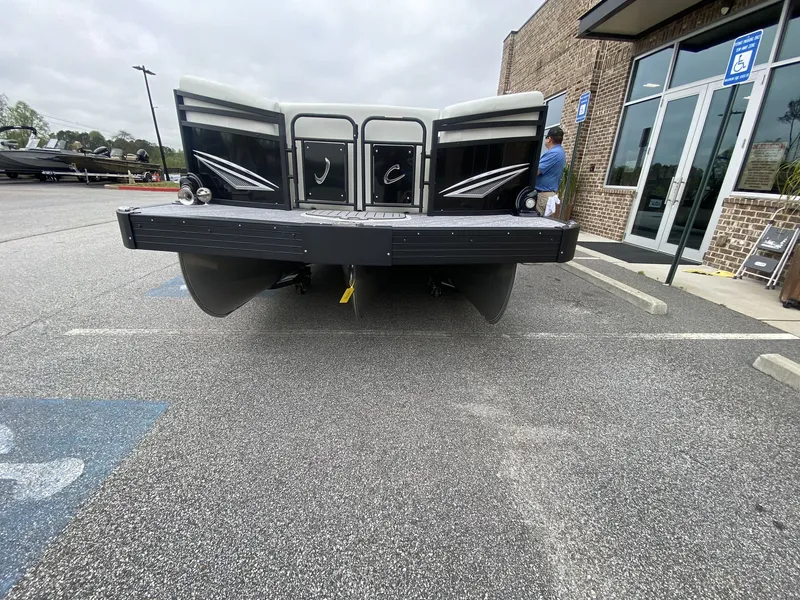 Slide: The Image of 2023 JC Swing Back 27TT Sport boat in parking lot. - 11