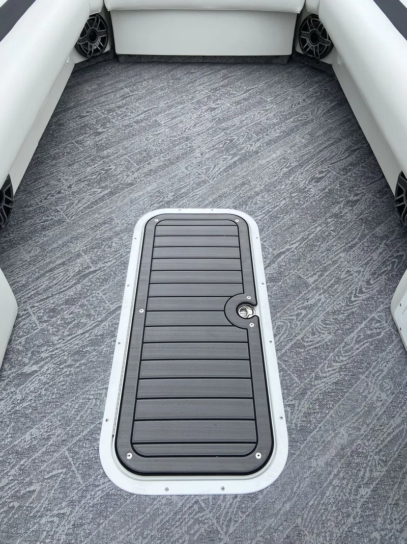 Slide: The Image of Interior of 2023 JC Swing Back 27TT Sport with gray flooring. - 13