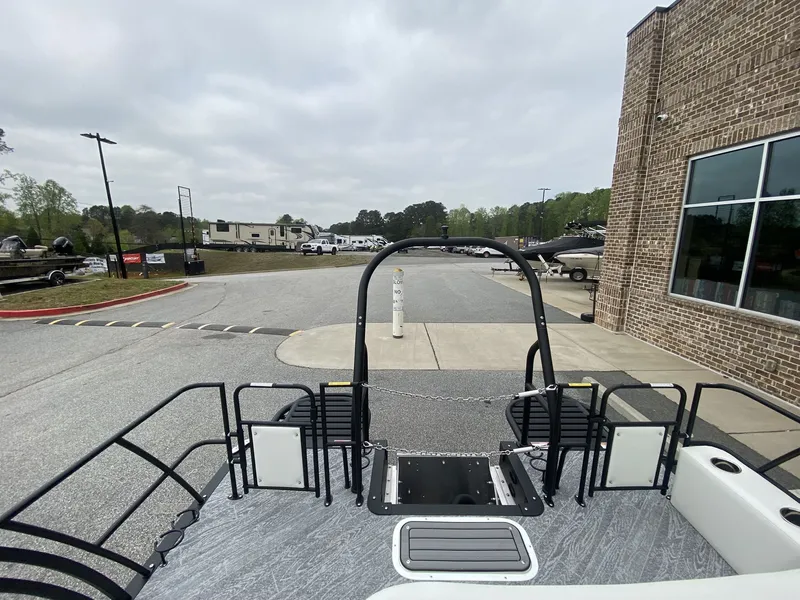 Slide: The Image of 2023 JC Swing Back 27TT Sport boat parked at dock. - 24