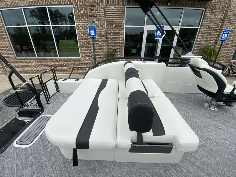 Slide: The Image of 2023 JC Swing Back 27TT Sport boat with luxurious seating area. - 30