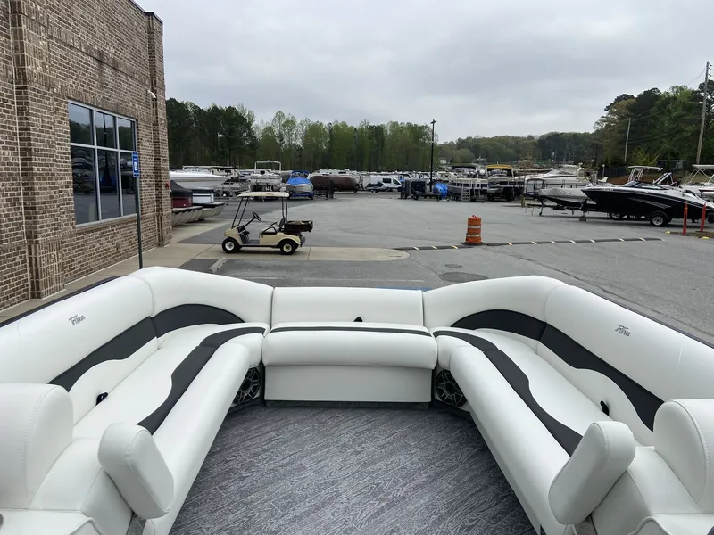 Slide: The Image of 2023 JC Swing Back 27TT Sport pontoon boat at marina. - 44